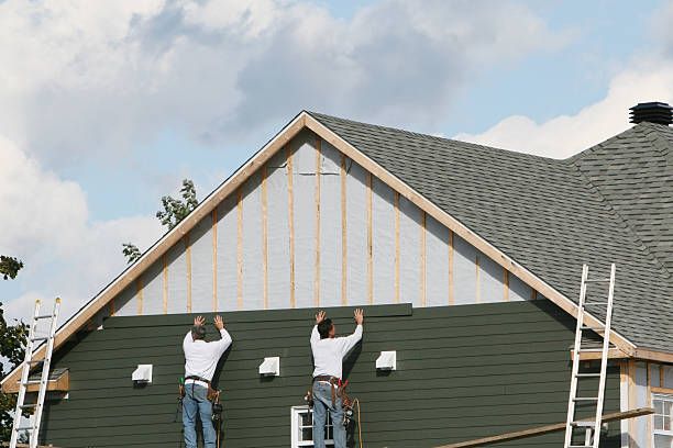 Professional Storm Damage Siding Repair technician working in Berryville, TX